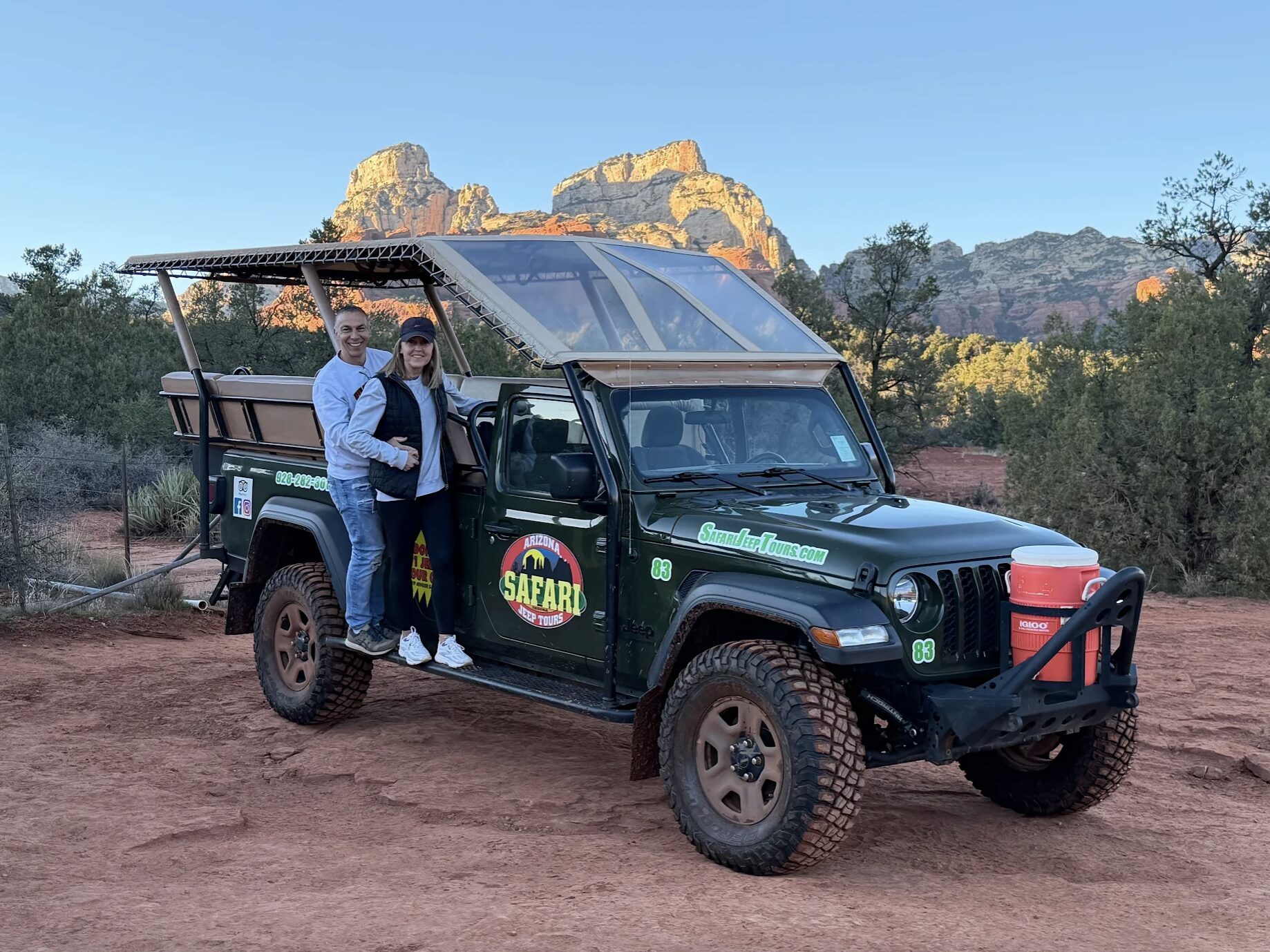 Guest standing on our custom Jeep.