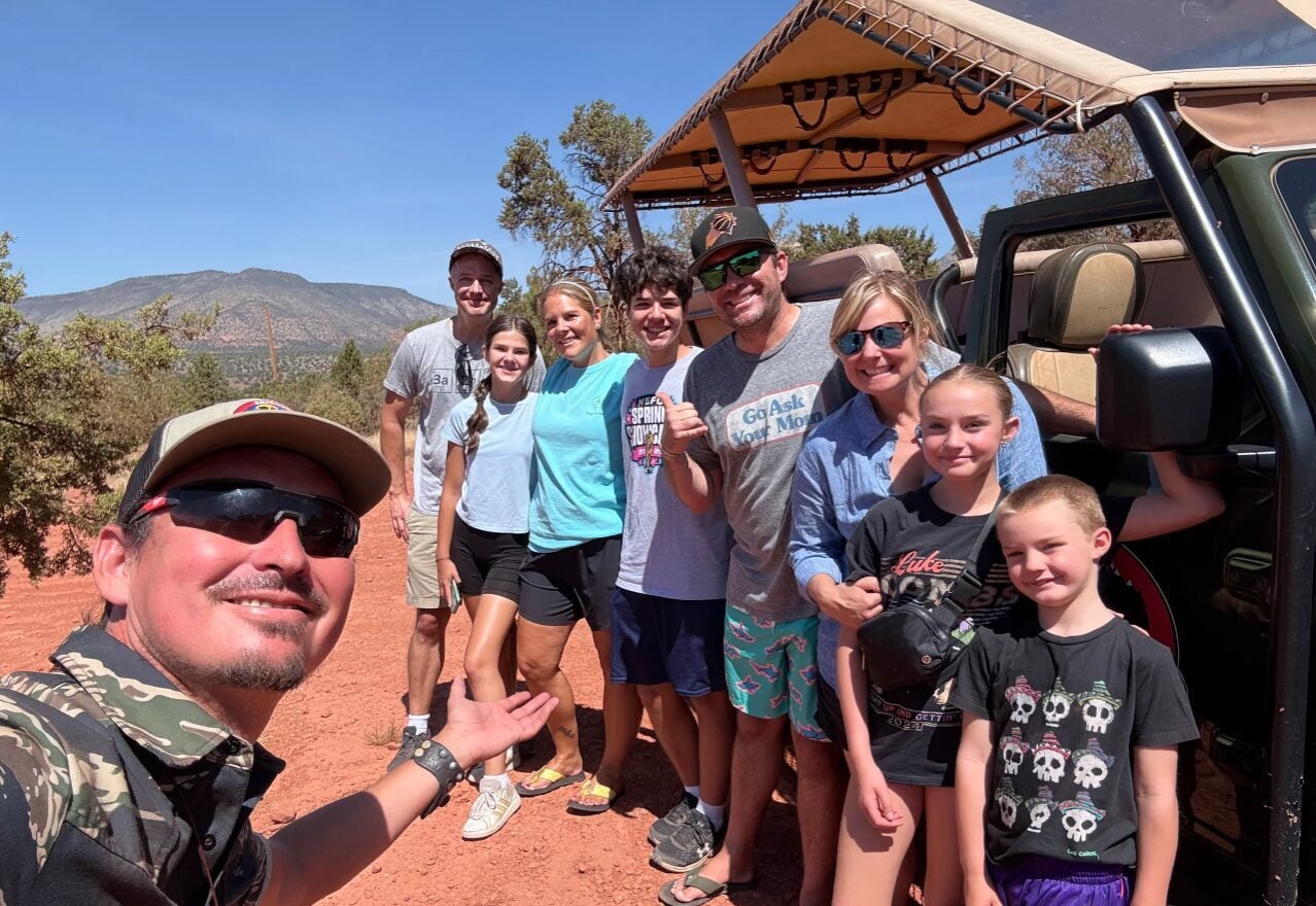 A large family in front of our Safari Jeep tour.