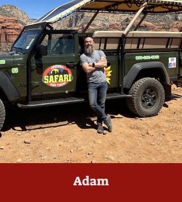 a man riding on the back of a truck