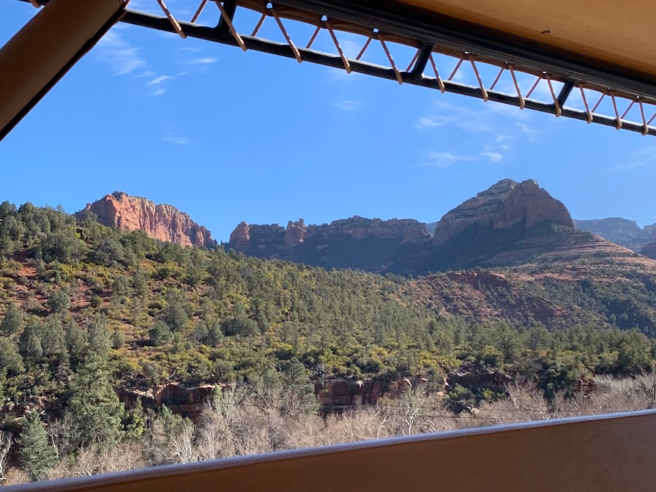 a bridge with a mountain in the background